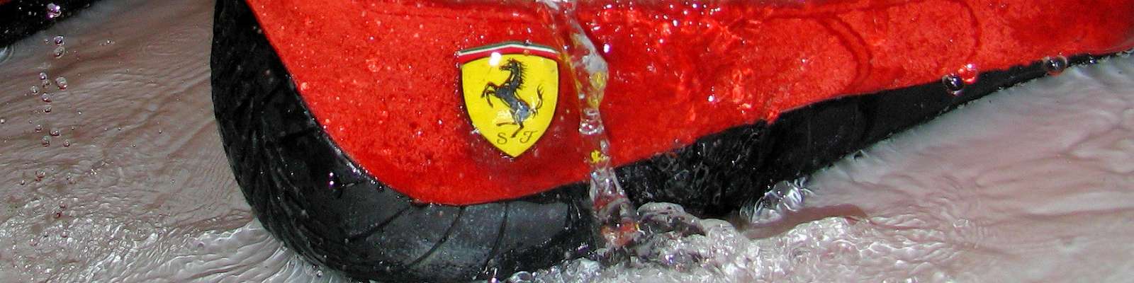 soaked Puma Ferrari Speedcats